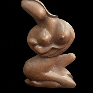 Vintage carved abstract statue Mother and infant.